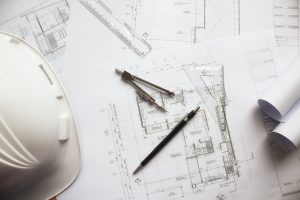 image-of-engineering-objects-on-workplace-top-view-construction-concept-engineering-tools-vintage-tone-retro-filter-effect-soft-focus-selective-focus